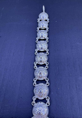 Dupult armband við troyggjuknappi