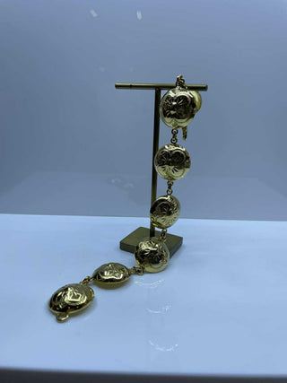 Gylt armband við kvarðaknappi