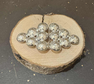 Beltaspenni við troyggjuknappi